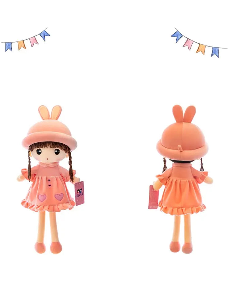 An orange rabbit fairy plush doll with pink accents and a layered skirt, shown from the front and back.