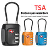 Drei schwarze, orange und blaue TSA-Passwortschlösser zum Sichern von Gepäck.