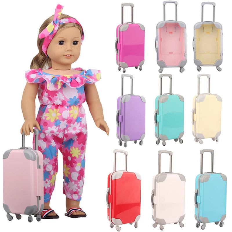 A set of colorful doll travel suitcases in pink, green, and red for 18-inch dolls.