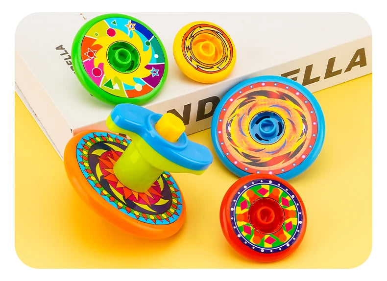 A collection of colorful five-layer stacking spinning top toys in various bright colors and shapes.