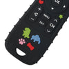 A close-up view of a black silicone baby teether toy shaped like a TV remote control.