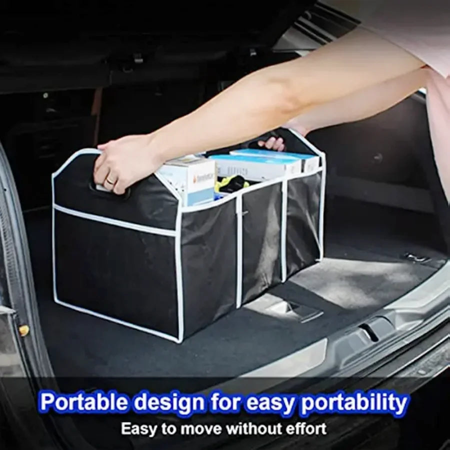 A hand places a black and white foldable car trunk organizer with three compartments into the trunk of a vehicle.