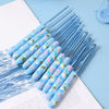 A set of blue ergonomic crochet hooks featuring a bee design, arranged diagonally on a white background.