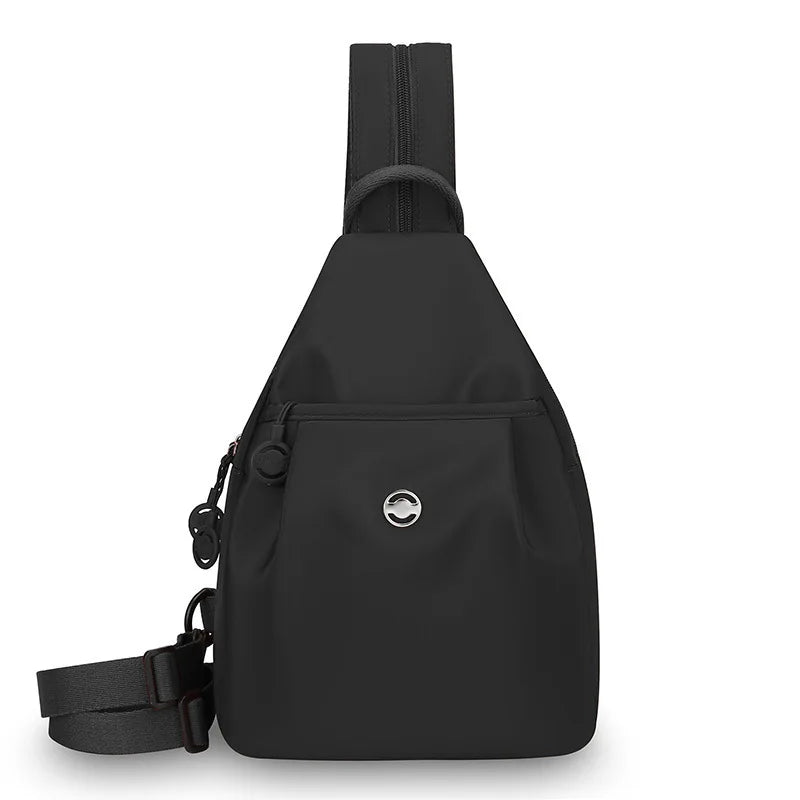 Black women's lightweight mini backpack with an anti-theft chest strap