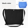 Black canvas tote bag with black straps and a silver button, shown next to a blue version.