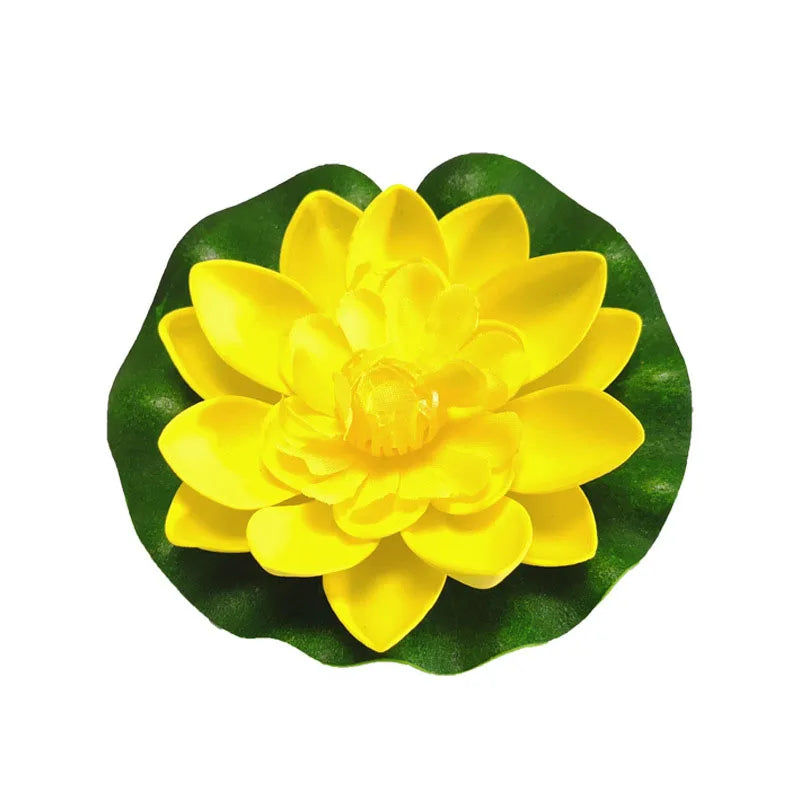 A bright yellow lifelike floating lotus flower used for pond and garden decor.