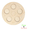 Wooden life cycle learning board with six circular cutouts showing animal and plant growth stages