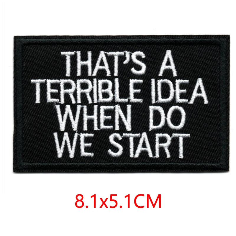 Black embroidered iron-on letter patch with white text that reads THAT'S A TERRIBLE IDEA WHEN DO WE START