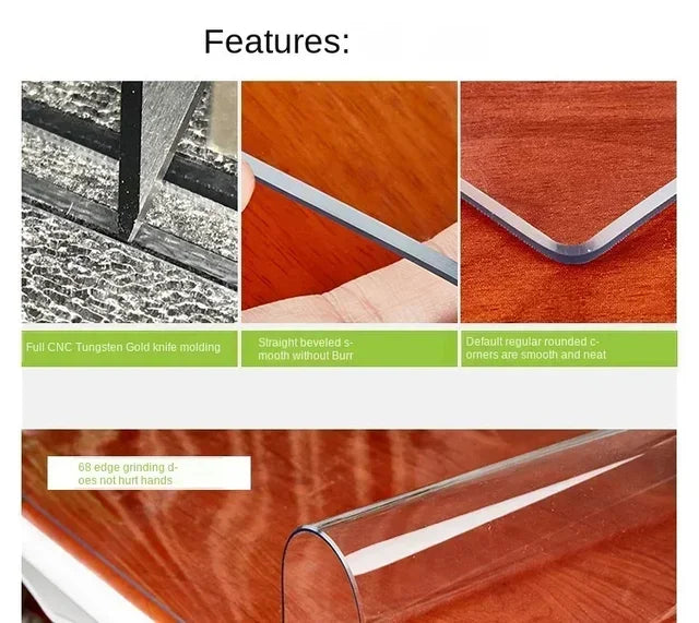 Close-up of a clear PVC waterproof table protector with a rounded edge resting on a wooden surface.
