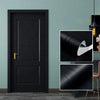 A close-up view of a matte black door with vertical wood grain texture and a gold handle, next to samples of the self-adhesiv