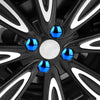 Close-up view of a black anti-rust wheel with blue nut caps and a silver center cap.