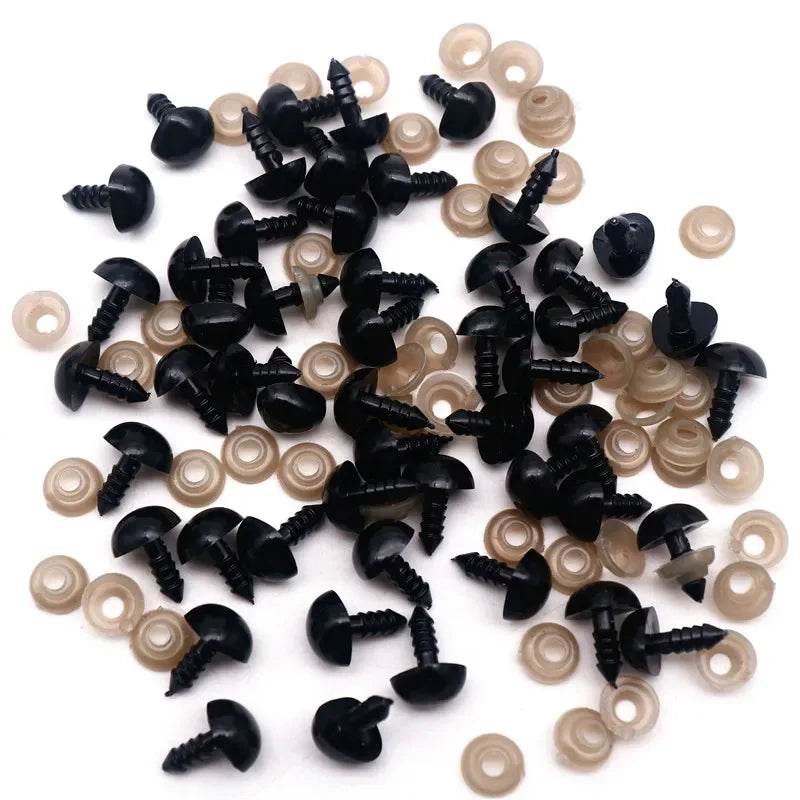 A collection of black safety noses with white washers for crafting and stuffed animals