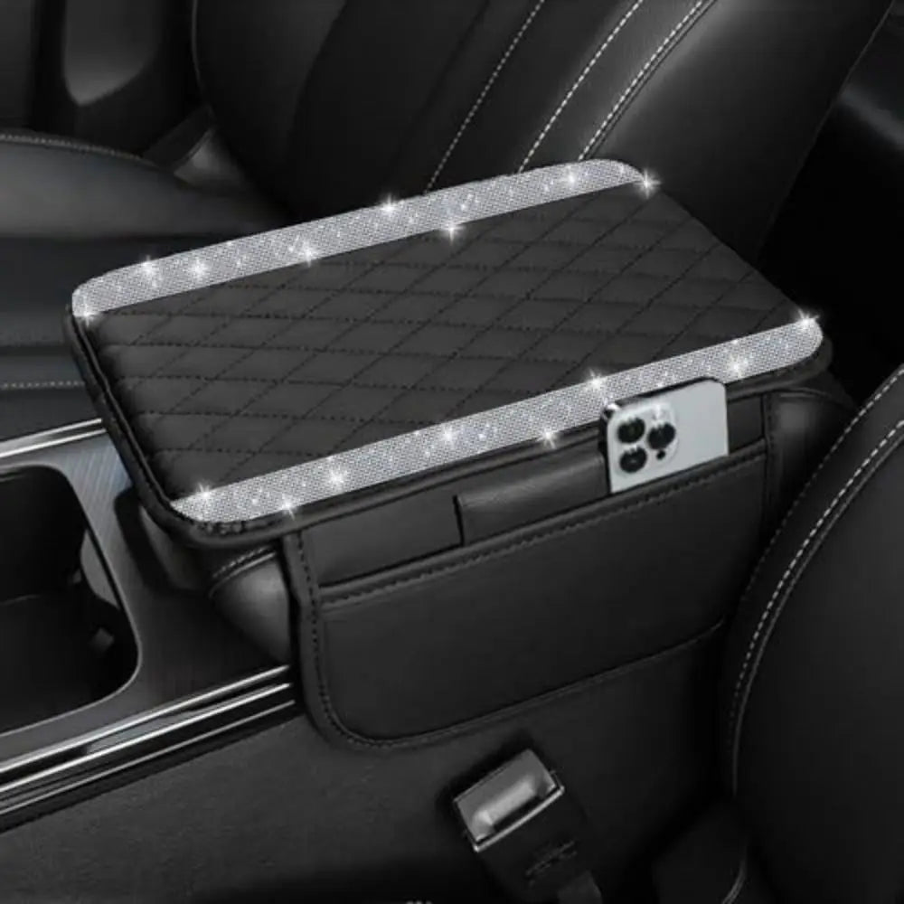 A black diamond quilted car armrest cover with storage is shown inside a vehicle interior.