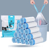 A stack of white and blue scented drawstring trash bags with handles is shown next to a package.