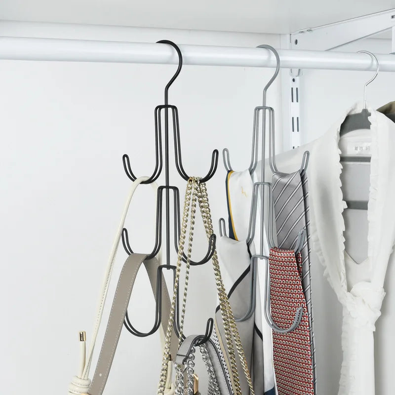 A black metal hanging organizer rack displaying various hats, bags, and scarves.