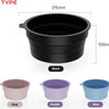 A set of black, pink, purple, and blue silicone bowls for ice bath and facial massage.