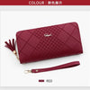 A deep red quilted PU leather wristlet clutch wallet with a gold chain detail.