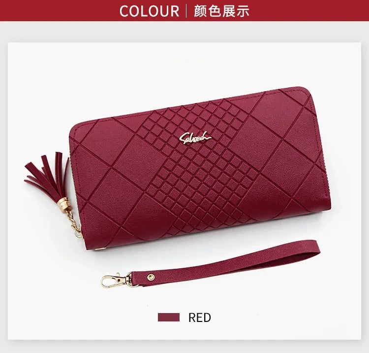 A deep red quilted PU leather wristlet clutch wallet with a gold chain detail.