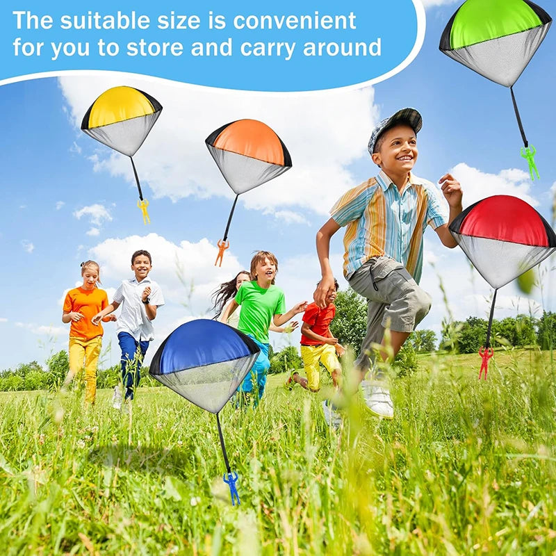 Children playing outdoors with colorful hand-thrown parachute toys in a grassy field.
