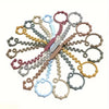 A collection of silicone anti-drop pacifier clips and teethers in various colors arranged radially.