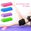 Various colored Eva foam rollers shown in a yoga pose on a purple mat.