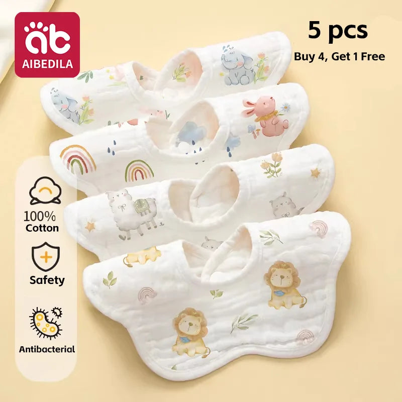 A set of five white soft cotton muslin bandana bibs featuring various cute animal designs for babies