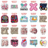 A collection of glitter acrylic nurse badge charms featuring various medical and nursing related designs.