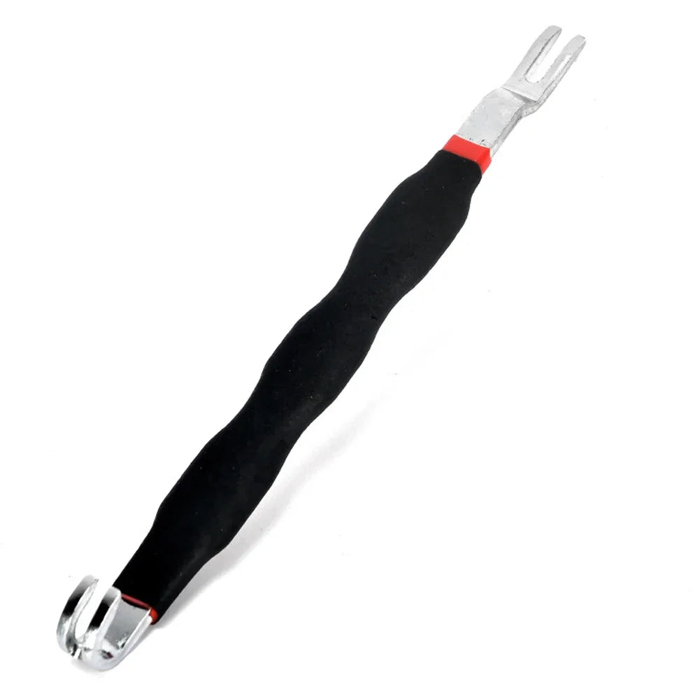 A black and silver automotive electrical terminal connector removal tool.