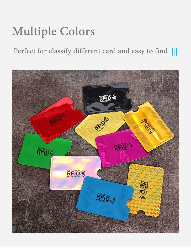 A collection of ten colorful RFID blocking card sleeves displayed on a dark surface.