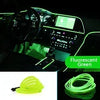 Flexible USB-powered neon green LED light strip coiled for accent lighting in a car or home.