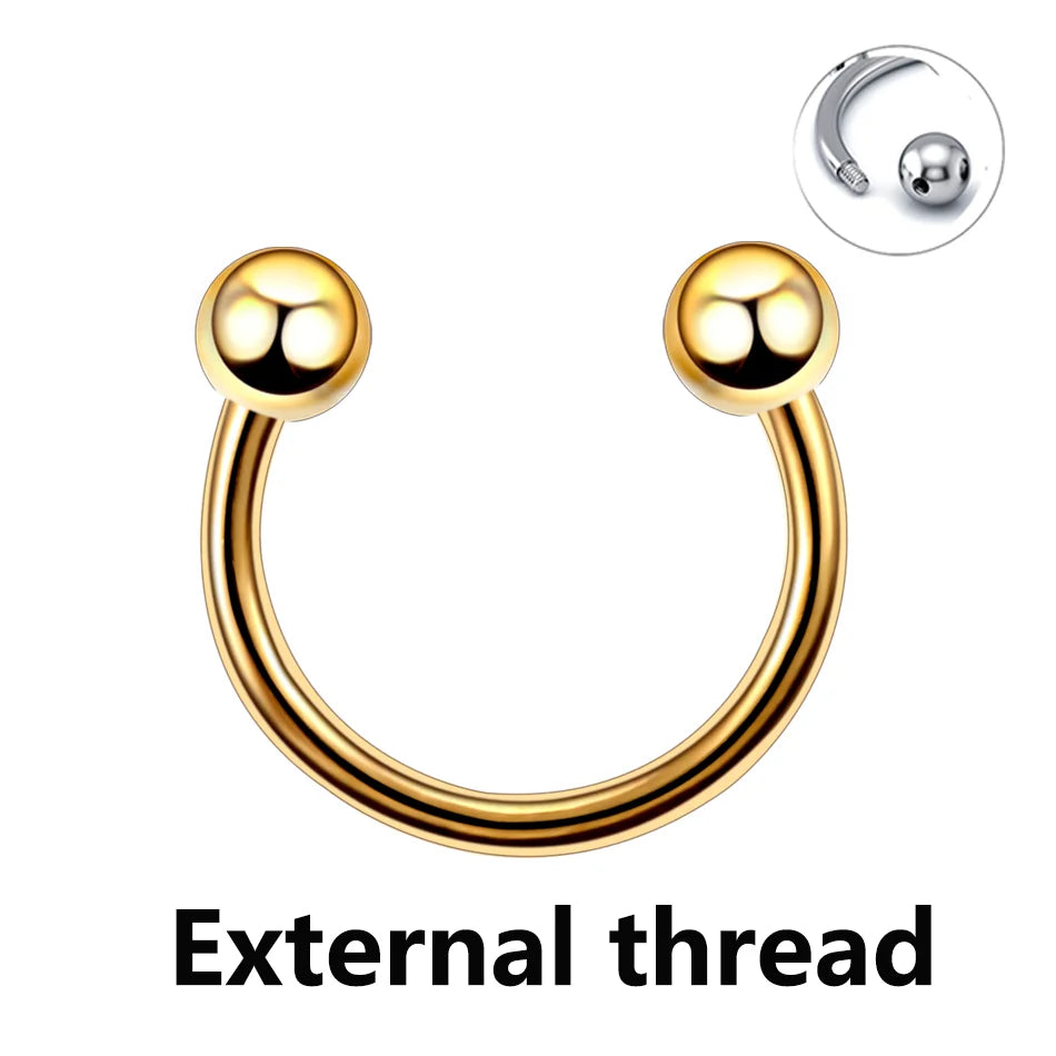 A gold-toned external thread horseshoe septum ring with a smooth ball design.