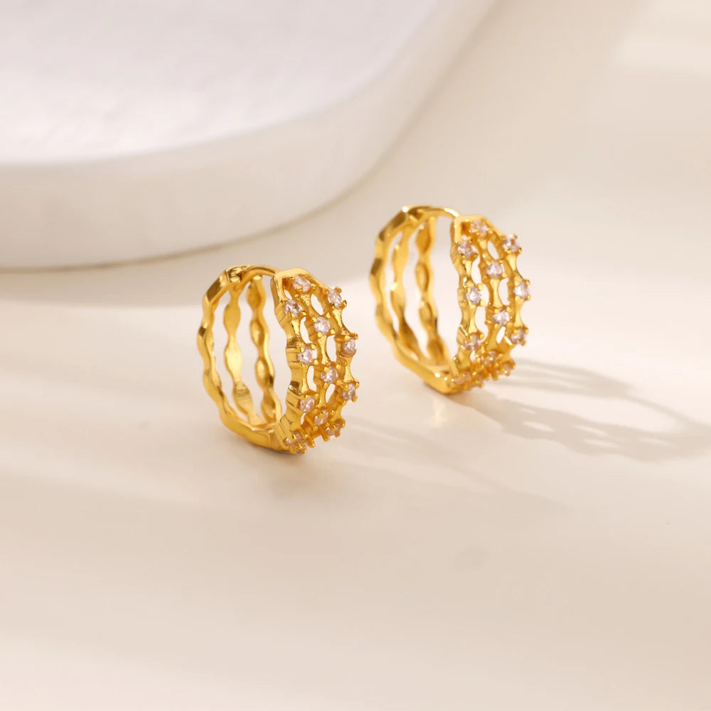 Boucles d'oreilles créoles en zircon cubique ton or