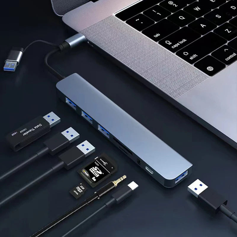 8-in-1 USB & USB-C Docking Hub with Audio Jack and Card Reader
