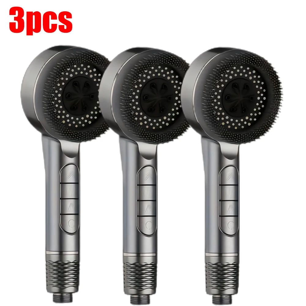 Three silver handheld shower heads with black silicone nozzles and silver bodies.