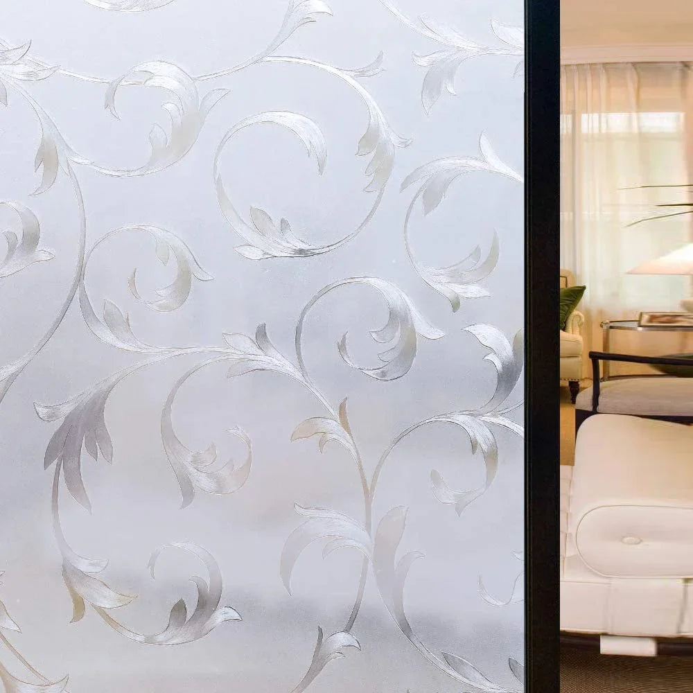Close-up of frosted stripe privacy window film with elegant swirling patterns.