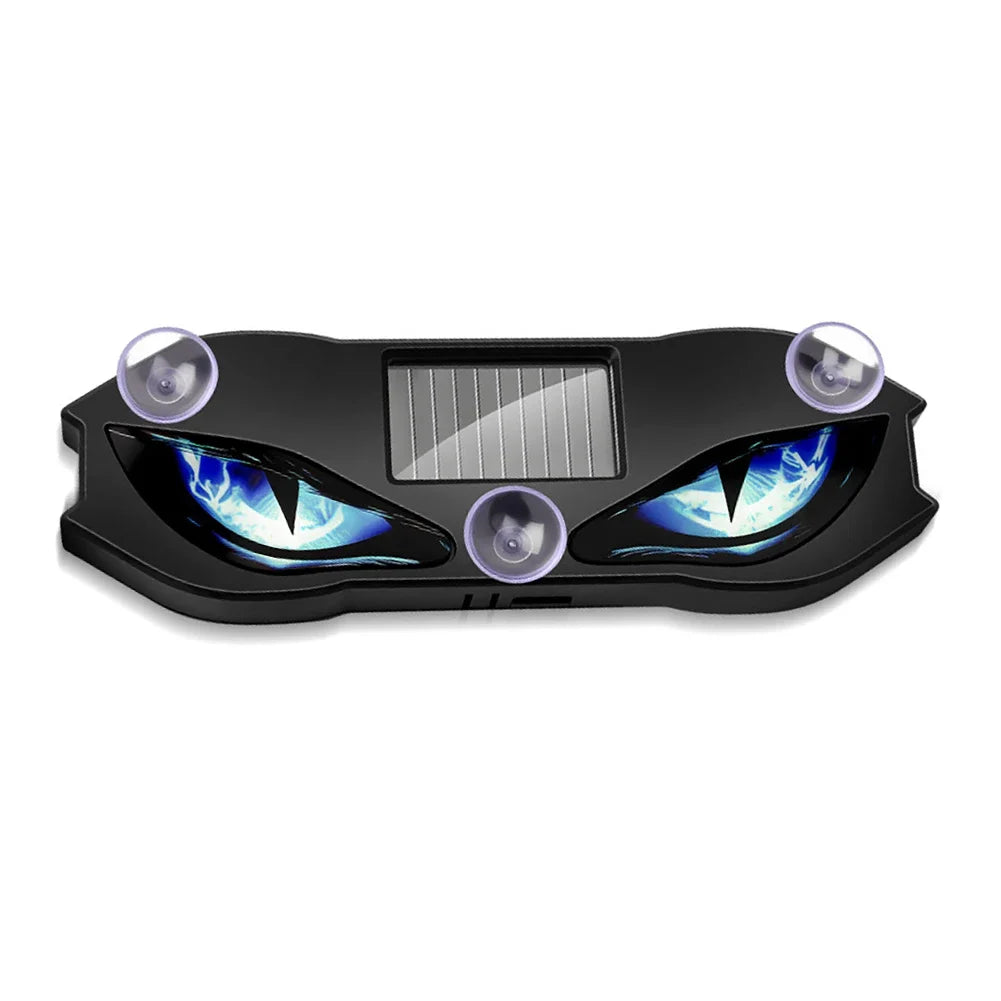 Black solar-powered devil eye LED rear window warning light with a solar panel and glowing blue accents