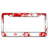 A rectangular aluminum license plate frame with a white background and red paint splatter on the edges.