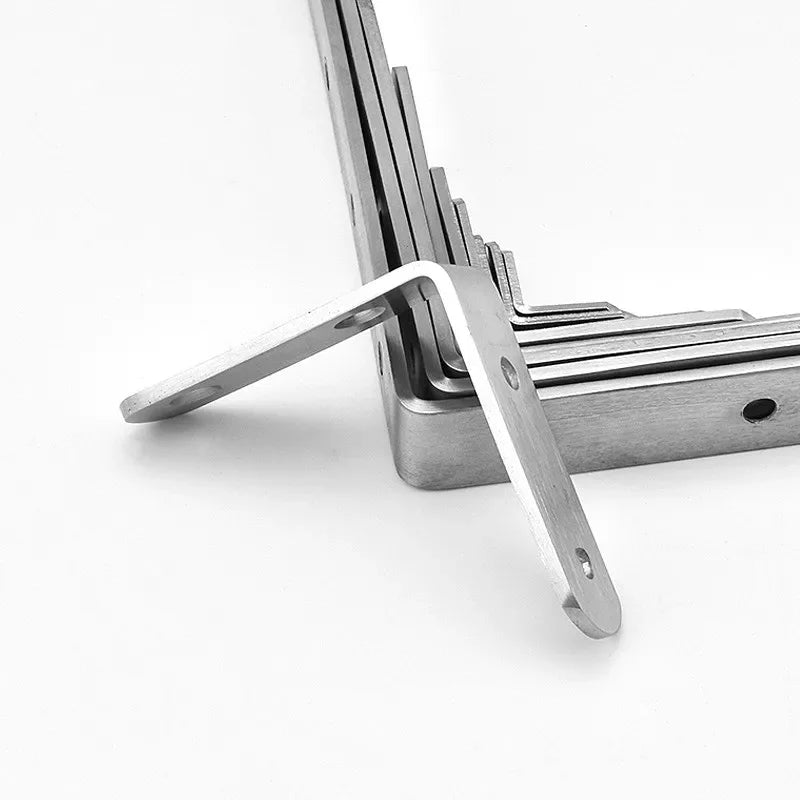 A set of four stainless steel 90-degree angle brackets with screws arranged in a rectangular holder.