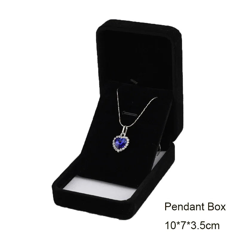 Elegant black velvet jewelry storage and gift box with a dark lining.