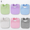 A set of six cotton bandana bibs in various pastel colors including green, purple, blue, and pink.