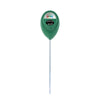A green soil moisture meter with a needle, used for measuring plant conditions.
