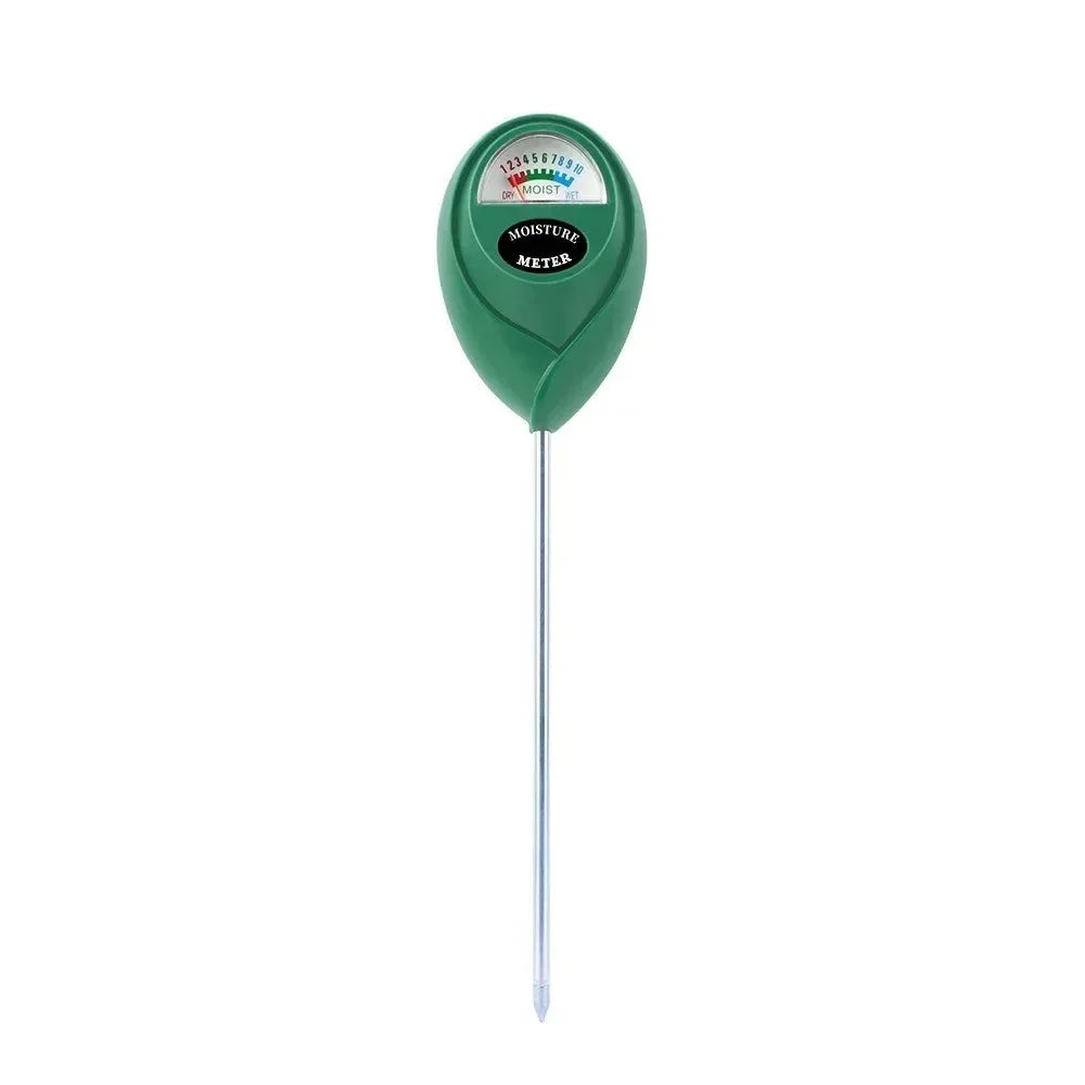 A green soil moisture meter with a needle, used for measuring plant conditions.