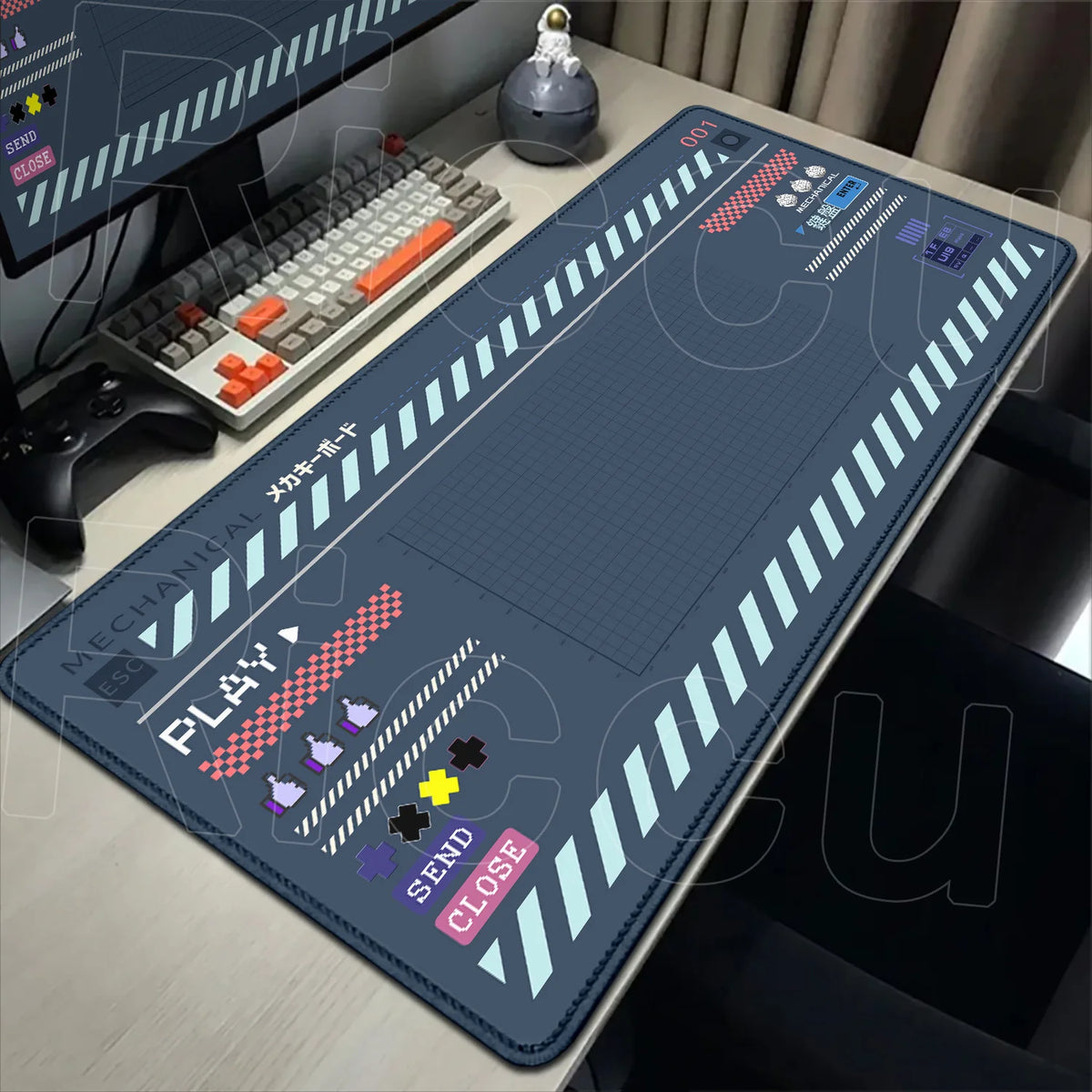 A large mouse pad featuring Japanese art and a non-slip rubber base is displayed on a desk next to a computer monitor and key