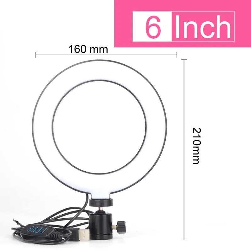 A circular LED ring light with a black adjustable tripod base and cable, measuring 6 inches.