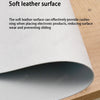 A close-up view of a soft leather surface desk mat in light gray, showing its texture and thickness.