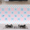 Pink and blue tiled kitchen splashback wallpaper featuring various food icons.