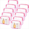 Clear PVC travel makeup and toiletry organizer bag with a zipper featuring pink trim.
