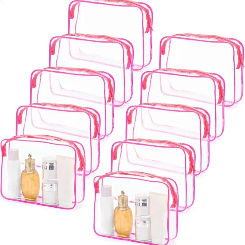 Clear PVC travel makeup and toiletry organizer bag with a zipper featuring pink trim.