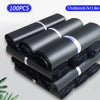 A stack of black self-seal poly mailer bags rolled up for shipping, with a size dimension indicated.