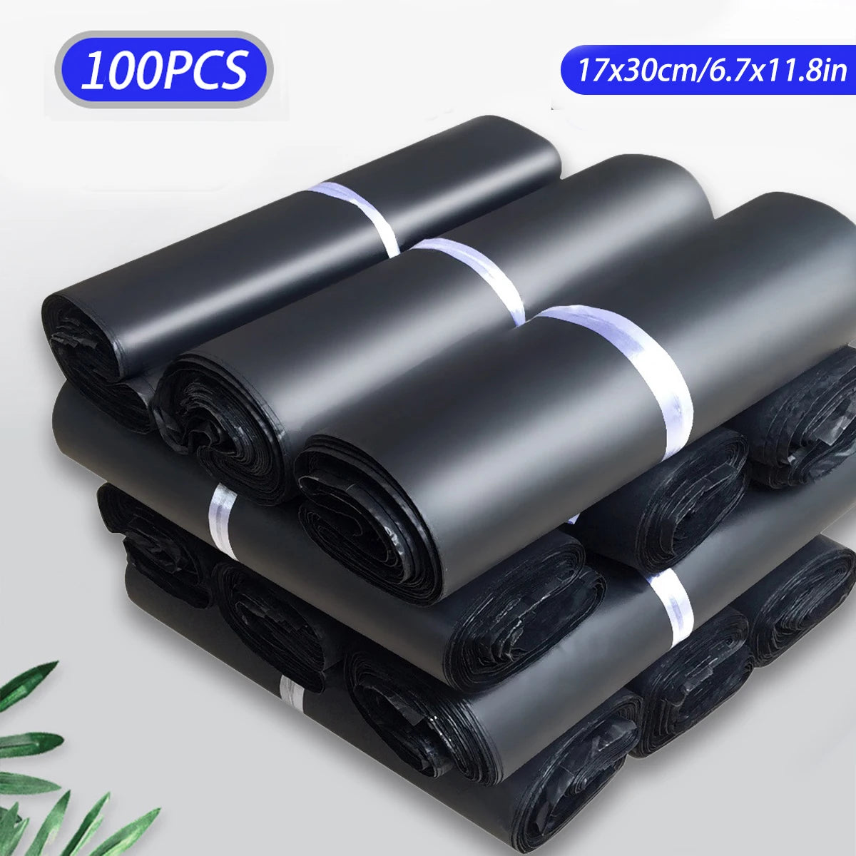 A stack of black self-seal poly mailer bags rolled up for shipping, with a size dimension indicated.